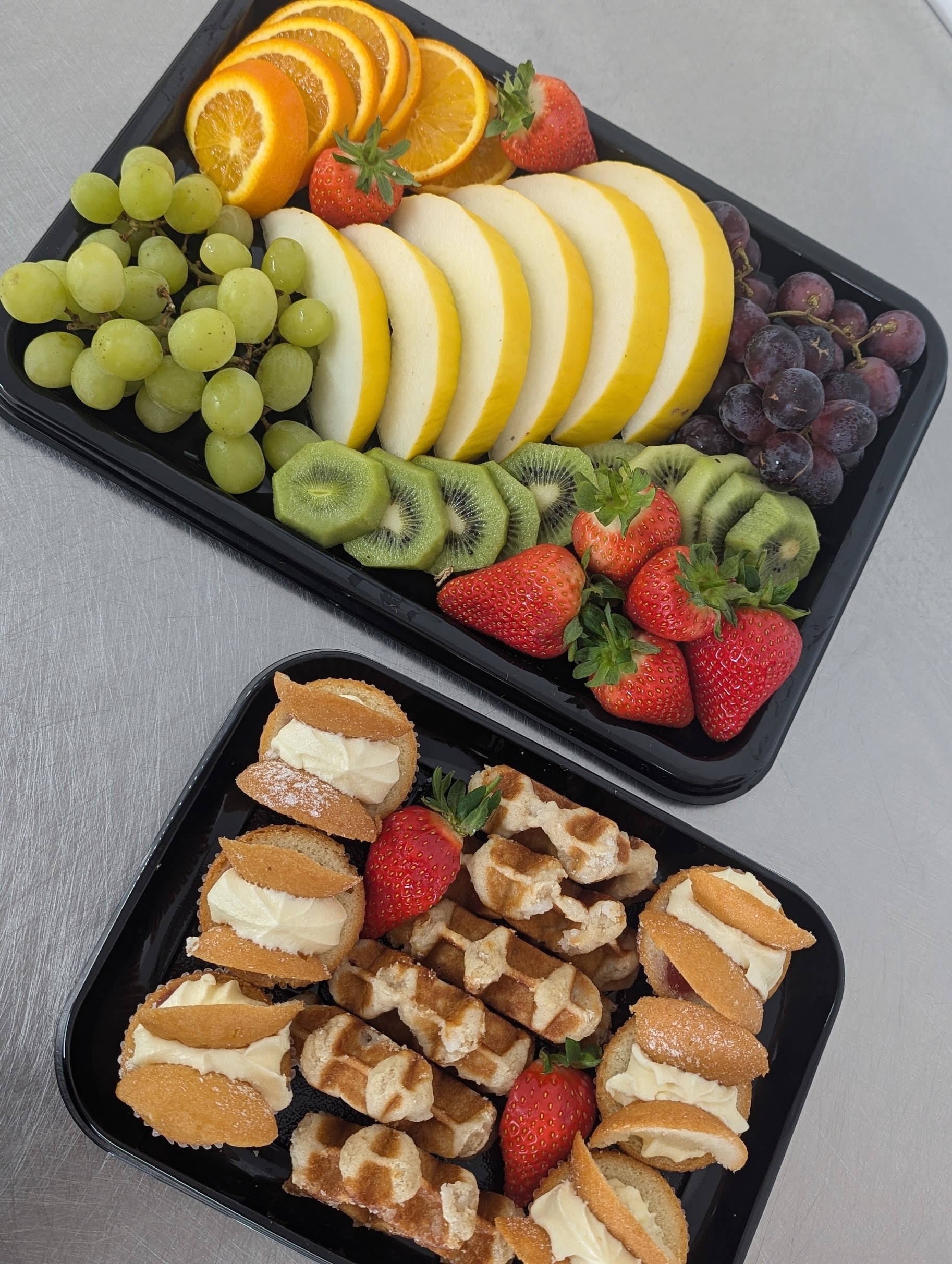 Fresh colourful salads prepared for office catering
